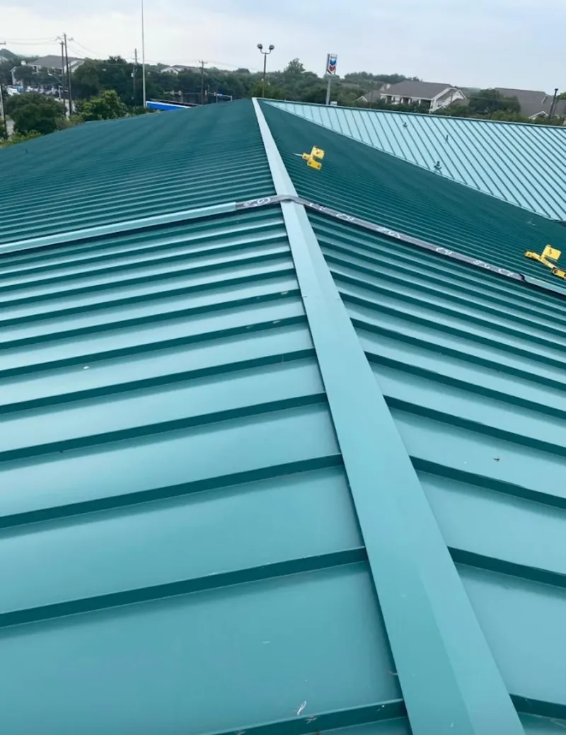 Green commercial metal roof ridge and valley for Metal Roof Repair in Bull Run